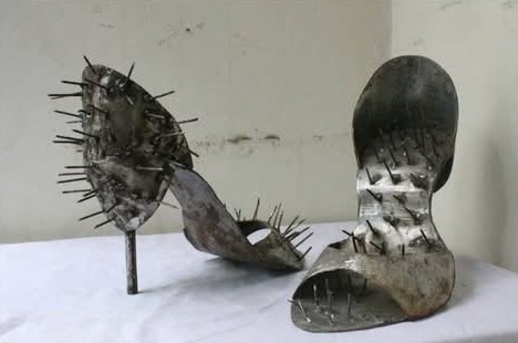 Second view of the spiked steel stilettos